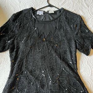 Stenay 100% silk! Beautiful!! Looks great with jeans or dressed up!